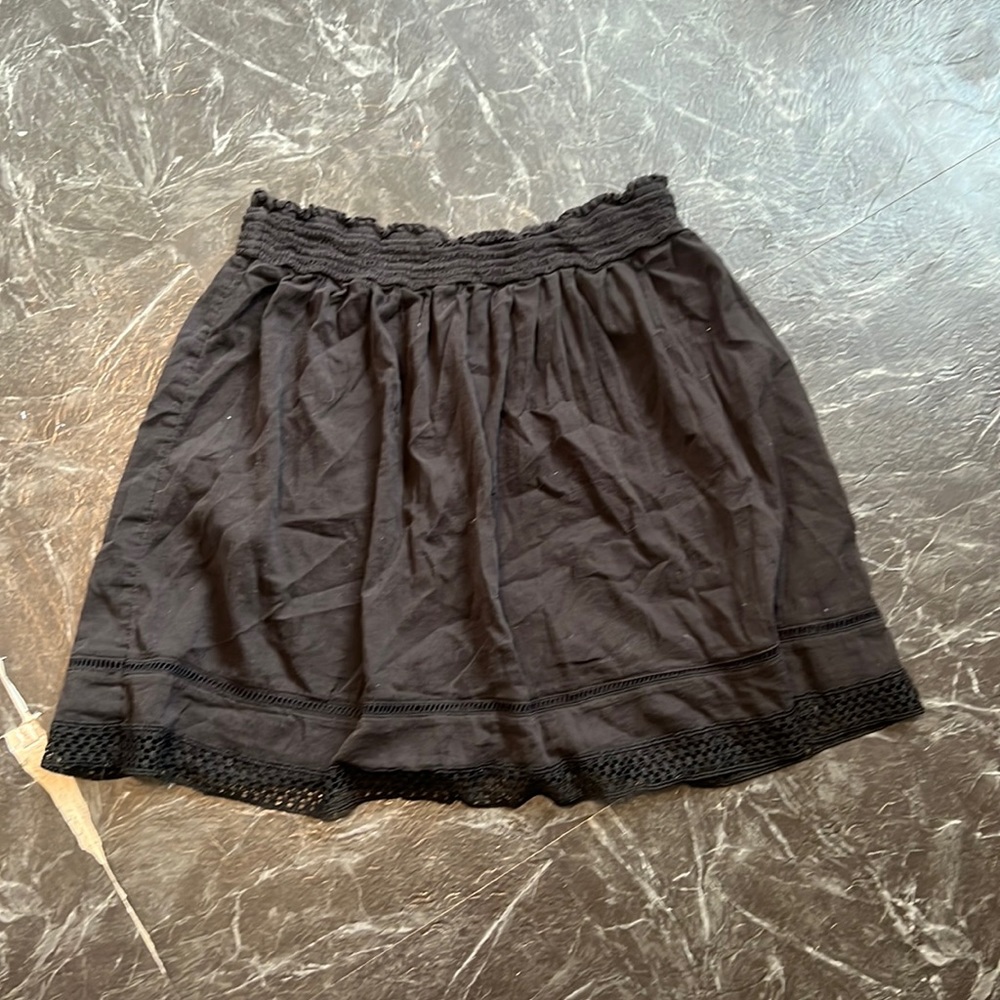 Mid length black skirt